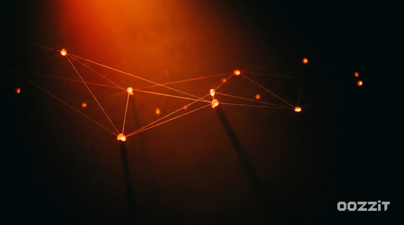 A sparse constellation of glowing orange nodes joined by thin threads of light