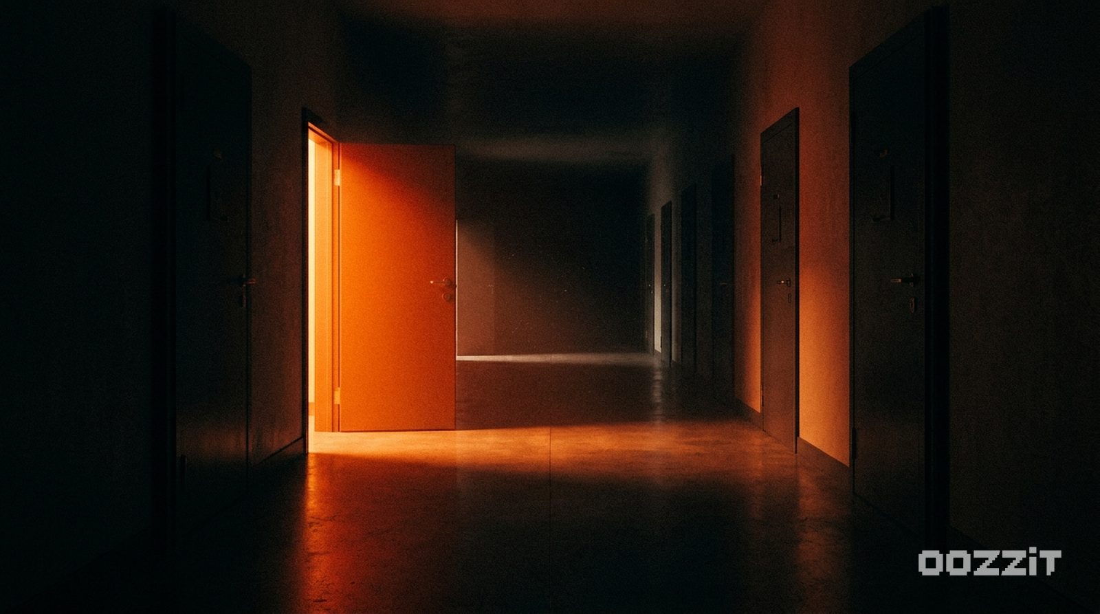 A dark corridor of closed doors with one open, spilling warm orange light